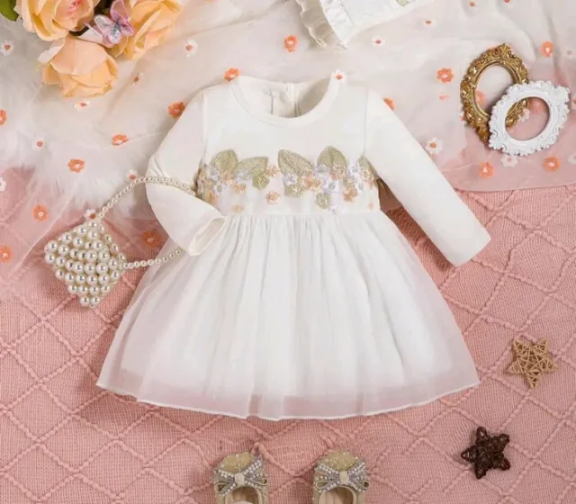Vestido blanco bebé con bordado floral