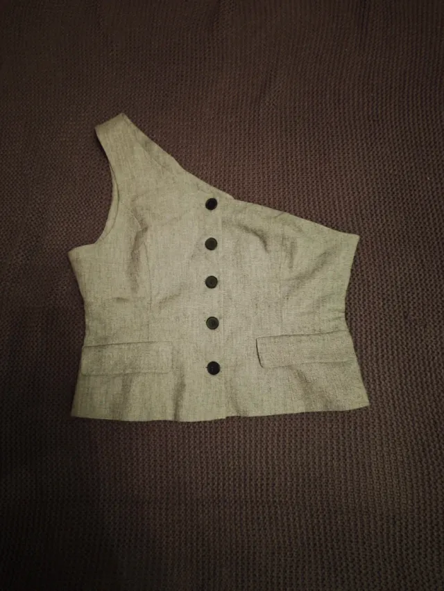 Chaleco gris asimétrico mujer