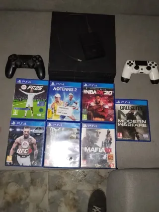 PS4 500GB + Disco Externo 3TB lleno+ 2 Mandos+5jue
