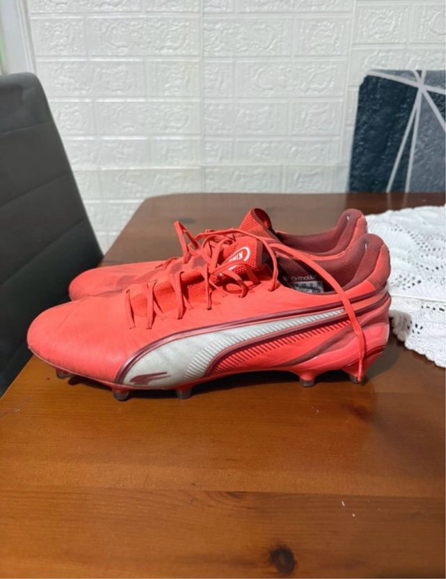 Botas de fútbol Puma King Ultimate FG Rojas