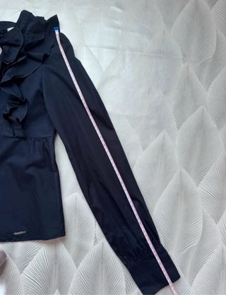 Blusa increíble con volantes y ondas