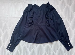 Blusa increíble con volantes y ondas