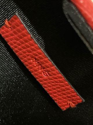 Bolso rojo Mango con cadena dorada