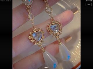 Pendientes largos dorados con perlas