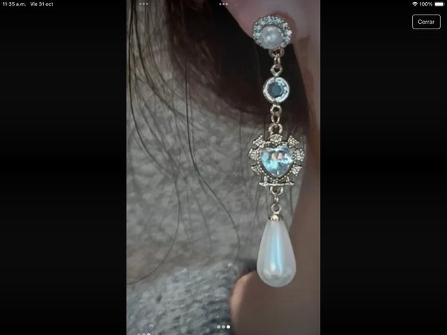 Pendientes largos dorados con perlas