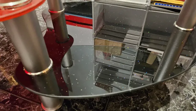 Mesa centro cristal ovalada negra,roja transparent