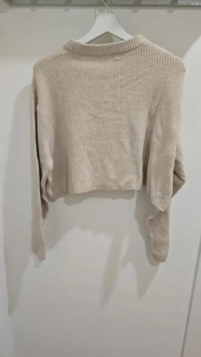 Jersey beige cuello alto