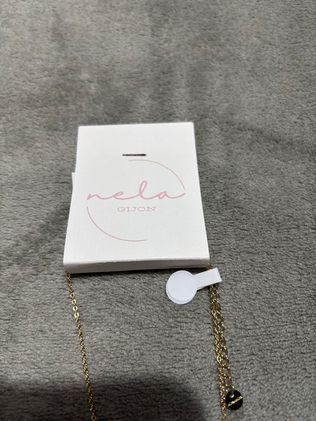 Collana Nela in acciaio dorato mezzaluna rosa