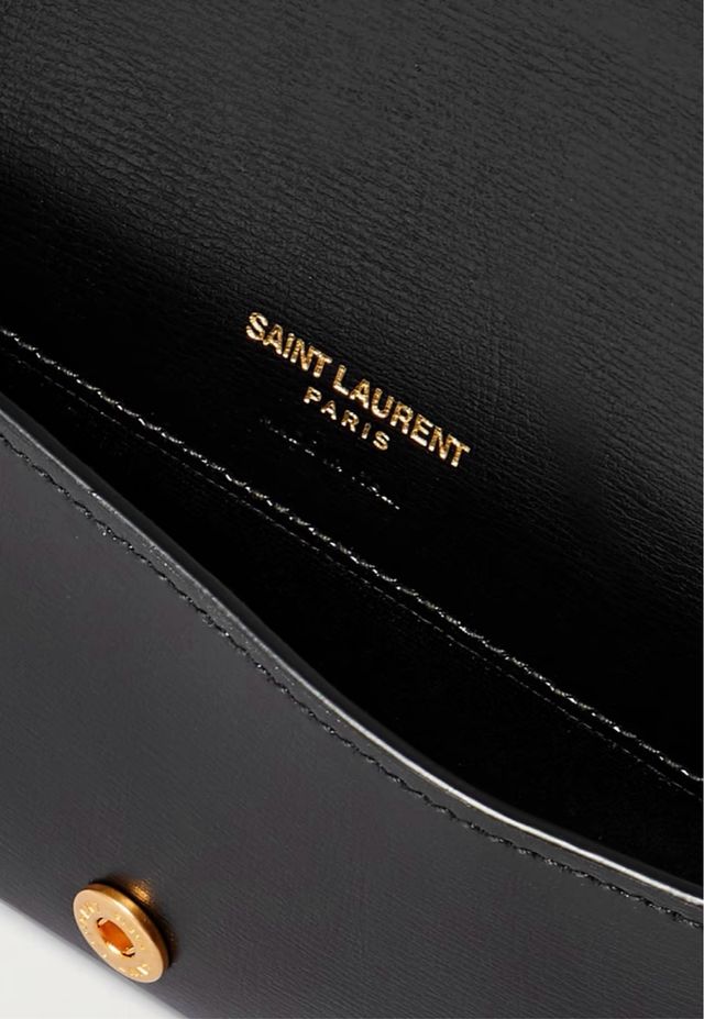 Bolso Saint Laurent negro y dorado