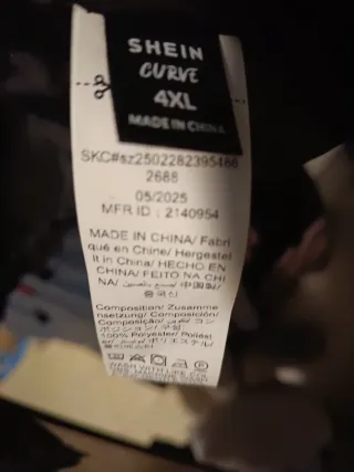 Vestido y torera fiesta morado y negro.