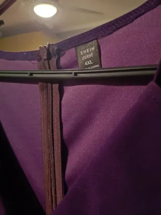 Vestido y torera fiesta morado y negro.