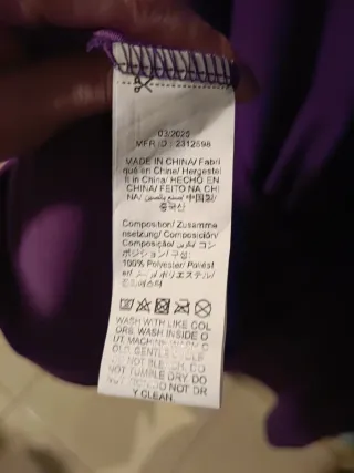 Vestido y torera fiesta morado y negro.