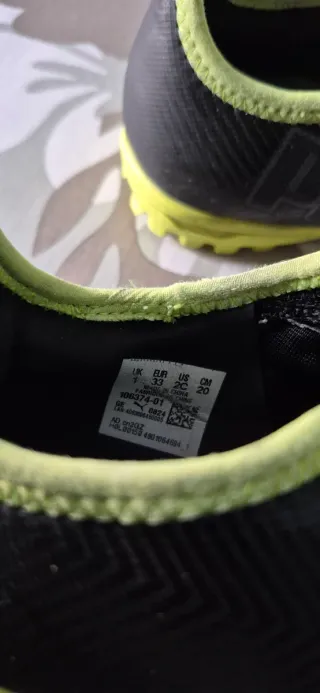 Botas de fútbol Puma niño negras y amarillas