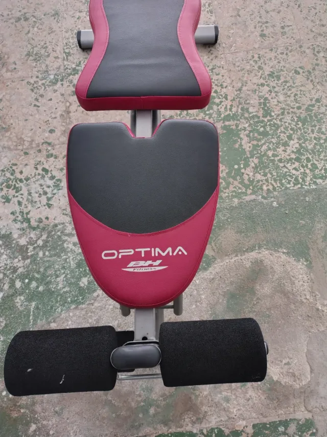 Banco de abdominales y pesas