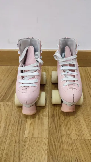 Patines rosas talla 31 oxelo