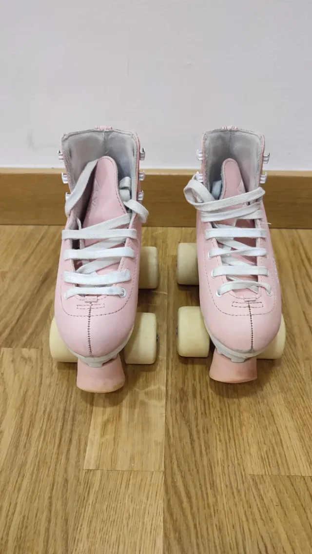Patines rosas talla 31 oxelo