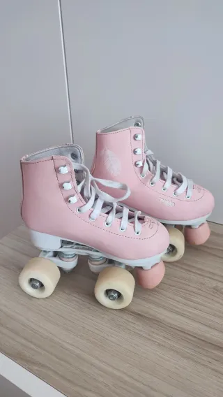 Patines rosas talla 31 oxelo