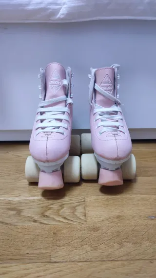Patines rosas talla 31 oxelo