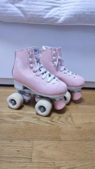 Patines rosas talla 31 oxelo