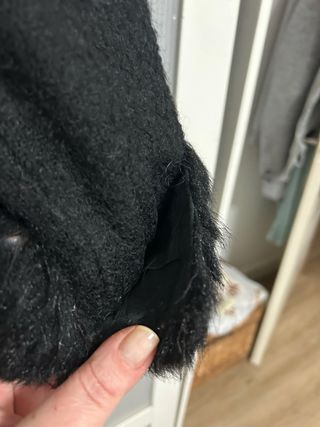 Chaqueta vintage negra con forro y manga descosida