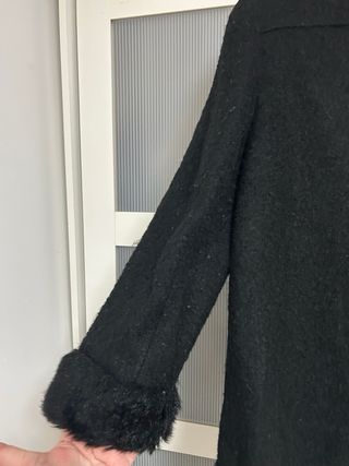 Chaqueta vintage negra con forro y manga descosida