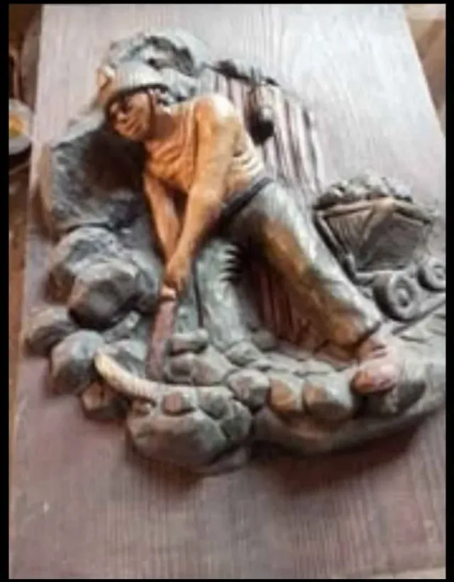 Cuadro tallado minero