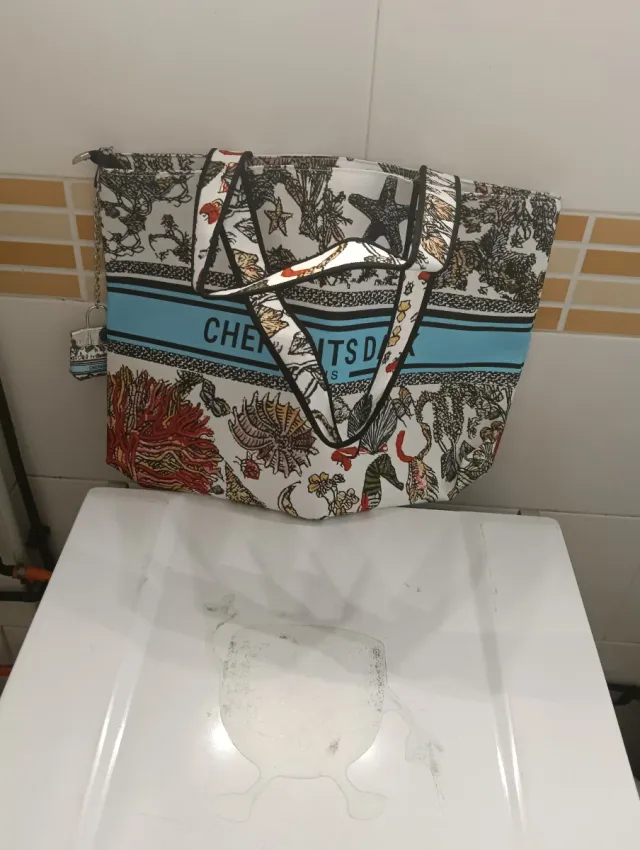 Bolso de mano estampado