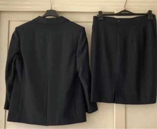 Tailleur elegante donna con bavero raso