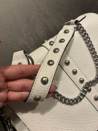 Borsa vera pelle borchiata con tracolla