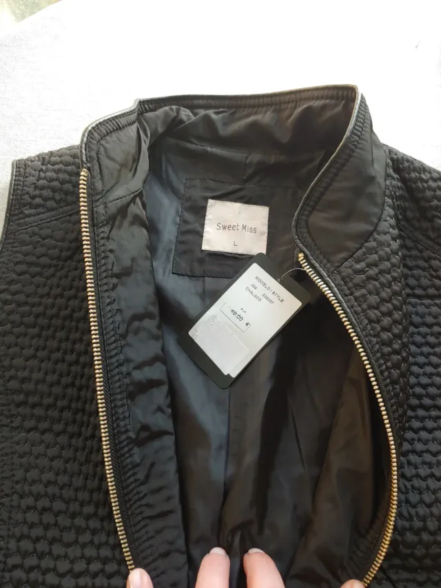 Chaleco negro mujer october,