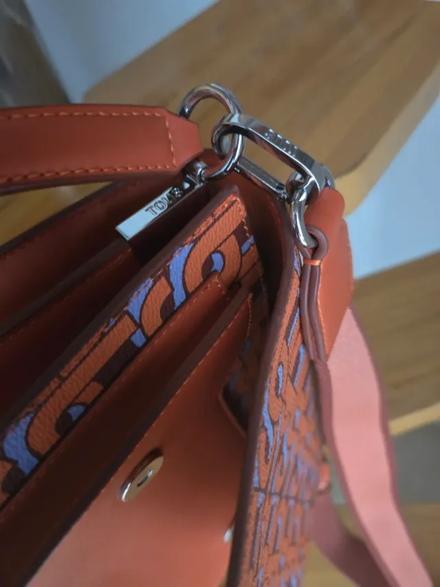 Bolso Tous estampado naranja y morado