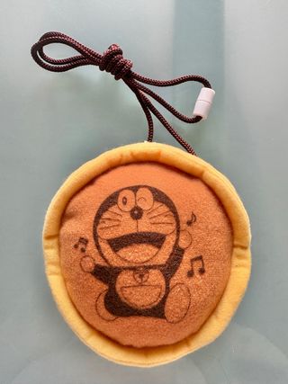 Monedero cartel Doraemon gato cosmico dorayaki