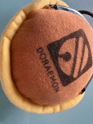 Monedero cartel Doraemon gato cosmico dorayaki