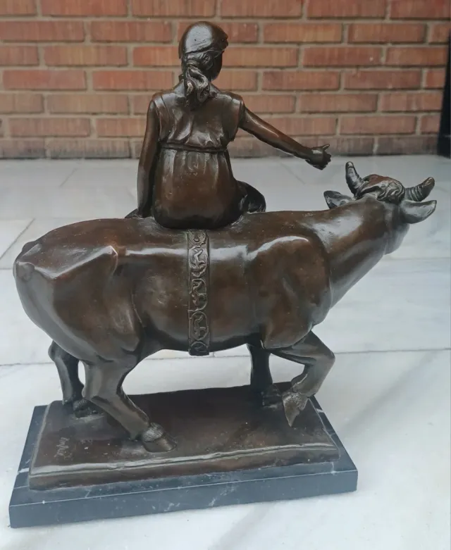 Bronzo firmato donna che cavalca un toro