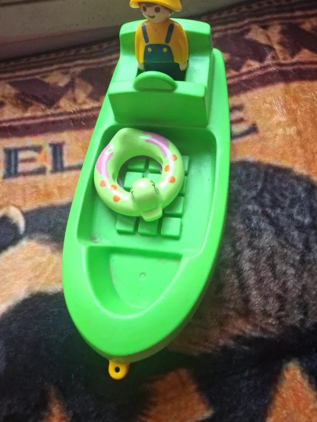 Barco Playmobil con figura y flotador