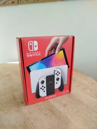 Nintendo Switch Oled blanca caja y manual  Tal c