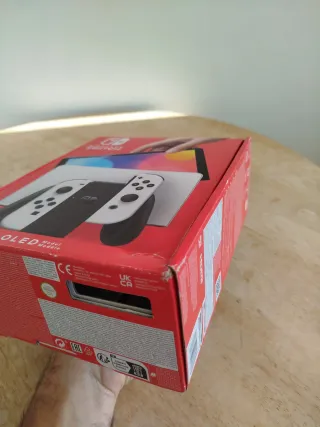 Nintendo Switch Oled blanca caja y manual  Tal c