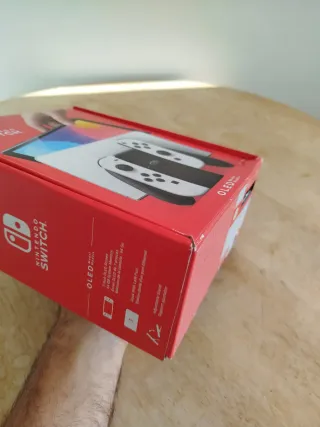 Nintendo Switch Oled blanca caja y manual  Tal c