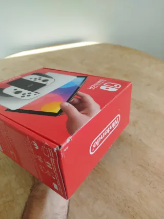 Nintendo Switch Oled blanca caja y manual  Tal c