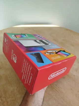 Nintendo Switch Oled blanca caja y manual  Tal c