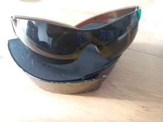 Gafas de sol Prada negras y marrones