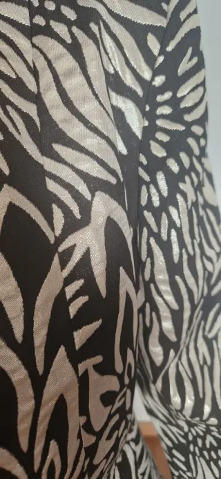 Elegante chaqueta fiesta negra y plateada