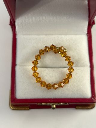 Anillo oro y cristales