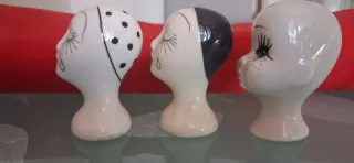 Tre testine decorative in ceramica