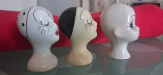 Tre testine decorative in ceramica