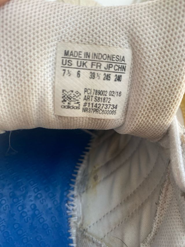 Zapatillas Adidas Superstar doradas y blancas