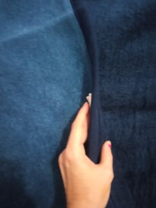 Manta individual azul marino como nueva