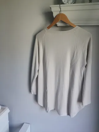 Jersey beige cuello redondo