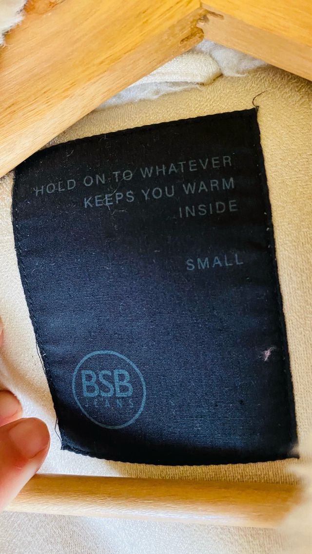 Parka acharolada y borreguito convertible