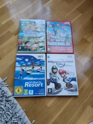 4 Juegos Wii: Mario Kart, Animal Cross,new super,